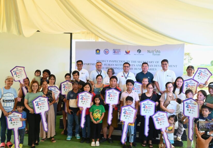 DHSUD Secretary Jose Ramon P. Aliling, Pag-IBIG Fund Chief Executive Officer Marilene B. Acosta, and P.A. Properties Chairman of the Board Romarico T. Alvarez joined beneficiaries of the Expanded Pambansang Pabahay para sa Pilipino (4PH) Program during the housing unit turnover ceremony at Nuvista Homes Lipa, Batangas