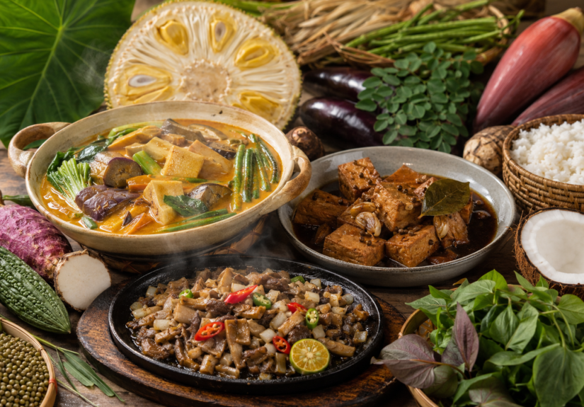 A variety of Asian dishes on a wooden table